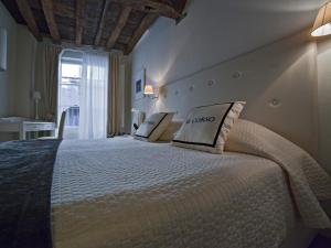 Postel nebo postele na pokoji v ubytování B&B Il Corso