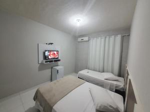 Posteľ alebo postele v izbe v ubytovaní Hotel Real Villes