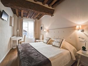 Postel nebo postele na pokoji v ubytování B&B Il Corso