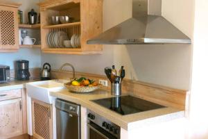 Kuchyňa alebo kuchynka v ubytovaní Apartamento gran terraza privada y vistas al mar