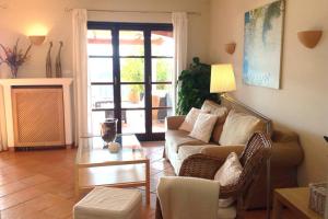 Posedenie v ubytovaní Apartamento gran terraza privada y vistas al mar
