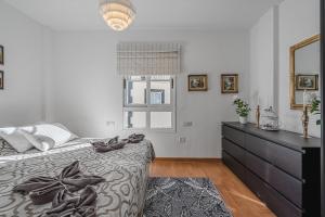 Postel nebo postele na pokoji v ubytování Penthouse Apartment With Ocean View