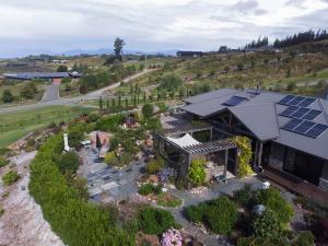 an aerial view of a house with solar panels on the roof at Redwood Valley B & B in Richmond