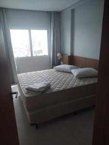 Postel nebo postele na pokoji v ubytování SALINAS EXCLUSIVE RESORT