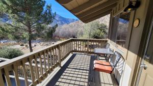 a balcony with a view of the mountains at Sequoia Lodge in Kernville