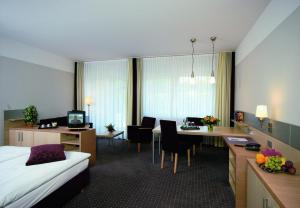 Postel nebo postele na pokoji v ubytování Garten-Hotel Ponick