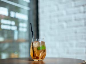 a drink sitting on top of a table at Hotel Pacific Kanazawa in Kanazawa