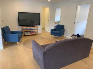 TV a/nebo společenská místnost v ubytování North Avoca - Superior Beach Flat + 6 fotografií
