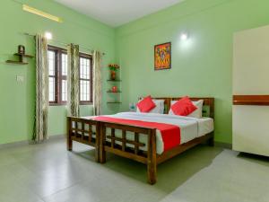 Postel nebo postele na pokoji v ubytování Gooseberry Family Retreats - Wayanad by KARAPUZHA RESORTS