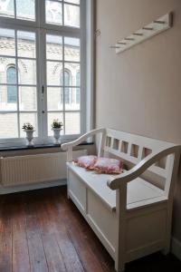 Postel nebo postele na pokoji v ubytování Huis Vandermersch