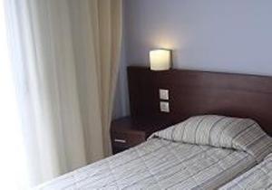 Postel nebo postele na pokoji v ubytování Hotel Electra
