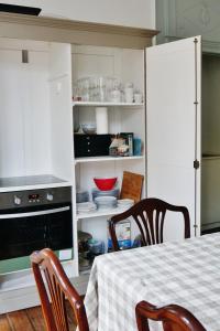 Kuchyň nebo kuchyňský kout v ubytování Huis Vandermersch