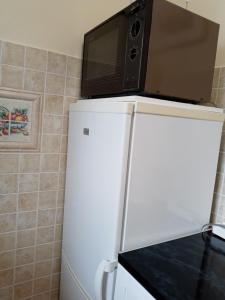 Kuchyň nebo kuchyňský kout v ubytování All-Inn