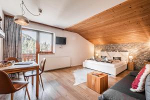 TV a/nebo společenská místnost v ubytování Alpin Resort Austria