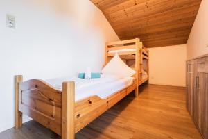 Postel nebo postele na pokoji v ubytování Alpin Resort Austria