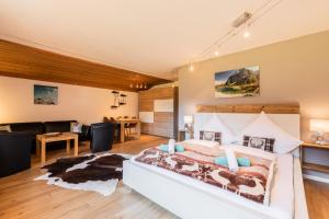 Postel nebo postele na pokoji v ubytování Alpin Resort Austria