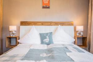 Postel nebo postele na pokoji v ubytování Alpin Resort Austria