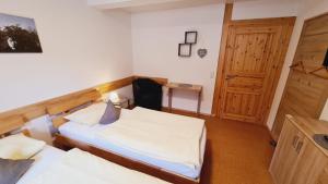 Ein Bett oder Betten in einem Zimmer der Unterkunft Pension Maintal Eltmann