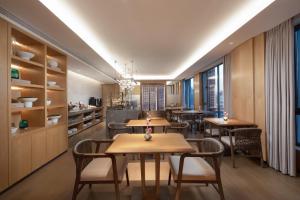 Restoran ili drugo mesto za obedovanje u objektu Grand WUJI Hotel, in The Unbound Collection by Hyatt