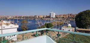 a view of a river from a balcony at The Green Nubian House in Aswan