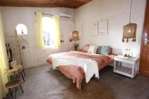 Katil atau katil-katil dalam bilik di EVA HUT Mui Ne Beach Hostel