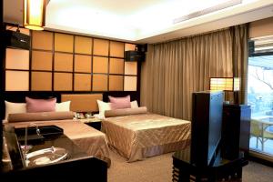 In-stone Motel 객실 침대