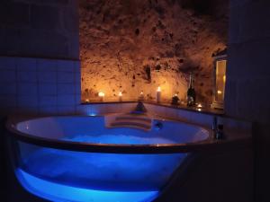 
a large swimming pool with a large crystal ball in the middle of it at Le Dodici Lune in Matera
