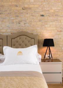 Ένα ή περισσότερα κρεβάτια σε δωμάτιο στο Agava Lux Rooms&Pool