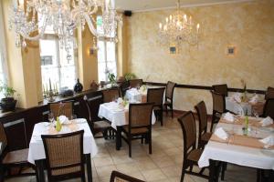 Reštaurácia alebo iné gastronomické zariadenie v ubytovaní Restaurant & Hotel Olive