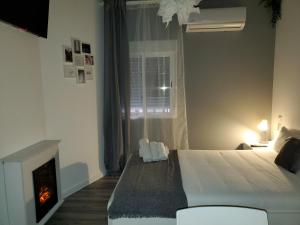 Postel nebo postele na pokoji v ubytování Intimo y Acogedor "algunos" con Bañera Hidromasaje