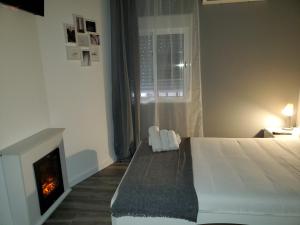 Postel nebo postele na pokoji v ubytování Intimo y Acogedor "algunos" con Bañera Hidromasaje
