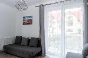 Posedenie v ubytovaní APARTAMENT Piątka