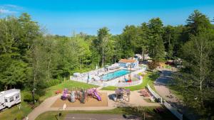 an aerial view of an rv and a swimming pool at Sun Outdoors Old Orchard Beach Downtown in Old Orchard Beach