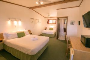 Postel nebo postele na pokoji v ubytování Gateway Motel