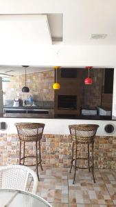 Η κουζίνα ή μικρή κουζίνα στο Casa c wifi e piscina próx a praia e a Alto Mourão