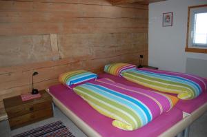 Postel nebo postele na pokoji v ubytování Casa Gion Giusep