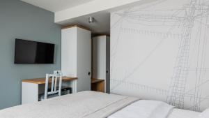 TV a/nebo společenská místnost v ubytování Port Bogaczewo Hotel & SPA