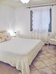 Posteľ alebo postele v izbe v ubytovaní Olive Bay Beach House Ammouliani