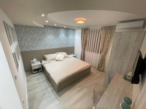Ένα ή περισσότερα κρεβάτια σε δωμάτιο στο Apartmani Jović