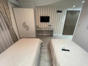 Ένα ή περισσότερα κρεβάτια σε δωμάτιο στο Apartmani Jović