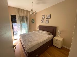 Ένα ή περισσότερα κρεβάτια σε δωμάτιο στο Apartment Sofia, City Centar