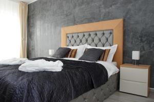 Postel nebo postele na pokoji v ubytování Apartament Safir