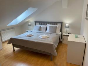 Voodi või voodid majutusasutuse Pálava House Mikulov toas