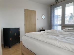Voodi või voodid majutusasutuse Pálava House Mikulov toas