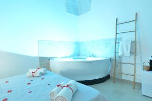 Llit o llits en una habitació de Trullo Suite