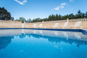 The swimming pool at or close to CASA GORKA Cala Saona
