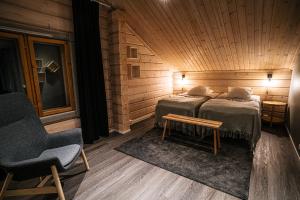 Postel nebo postele na pokoji v ubytování Levi Black Apartments
