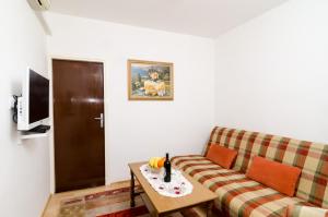 TV a/nebo společenská místnost v ubytování Apartment Amela