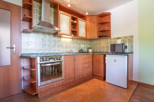 Kuchyň nebo kuchyňský kout v ubytování Apartmán Lípa-Lipno