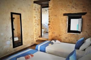 Posteľ alebo postele v izbe v ubytovaní Siamoformentera Villa Annabella